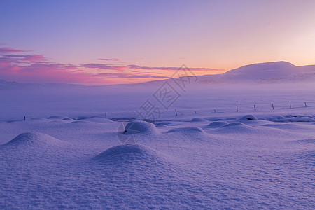 雪之瀑布冰岛日出迷人自然美景背景