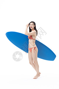 青年泳装美女玩冲浪板背景图片