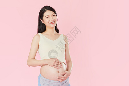 女性腹部孕妇背景