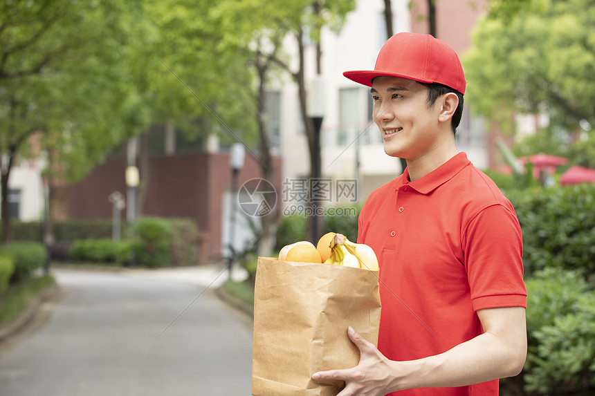 快递小哥生鲜水果配送服务图片