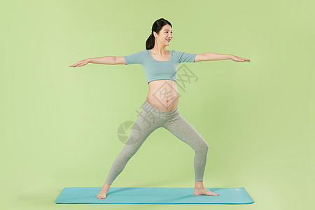 孕妇做瑜伽运动背景图片