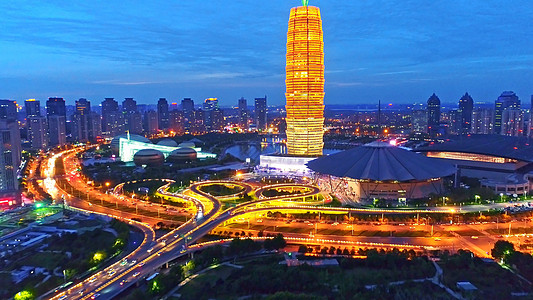 郑州城市剪影郑州东城市夜景背景