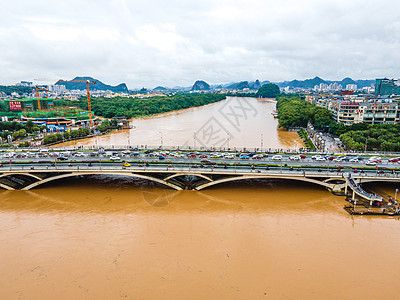 夏季南方暴雨洪涝灾害桂林漓江解放桥洪峰背景图片