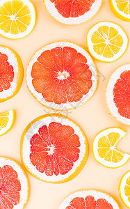 新鲜的红柚和柠檬水果背景图片