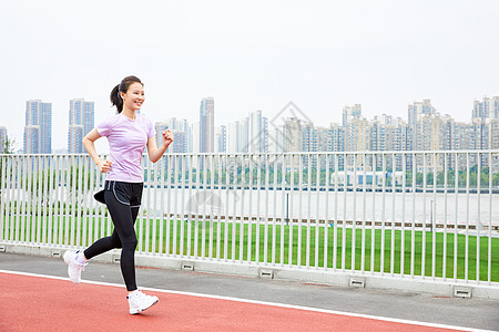 户外健身美女青年女性户外健身跑步背景