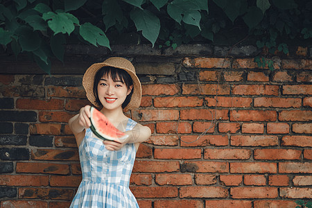 吃西瓜的女人夏季小清新吃西瓜的女孩背景