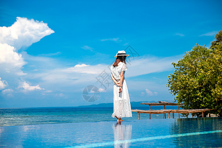 菲律宾海岛海边美女背影背景