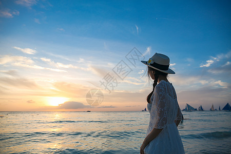 菲律宾长滩岛海边美女背影背景