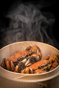 蒸笼蒸螃蟹背景图片