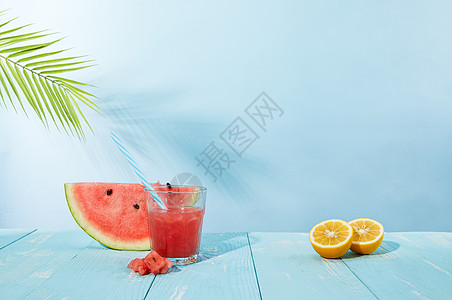 创意西瓜汁创意夏日水果西瓜柠檬组合背景