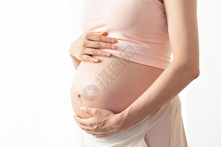 孕妇照肚子特写孕妇肚子特写背景