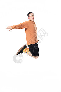 年轻街舞男生空中动作图片