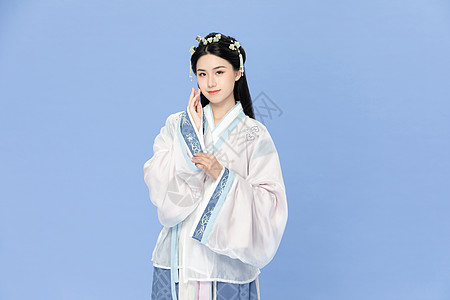  古风汉服美女遮袖子背景图片