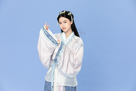  古风汉服美女遮袖子背景图片