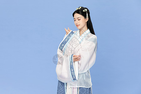  古风汉服美女遮袖子图片