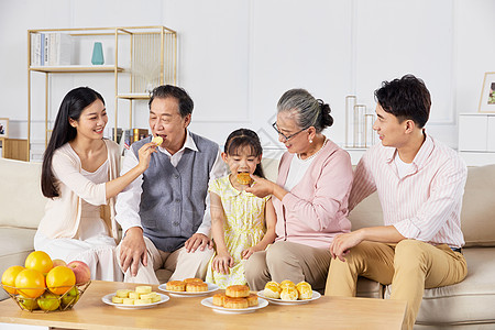 国庆节快乐中秋家庭团聚吃月饼背景