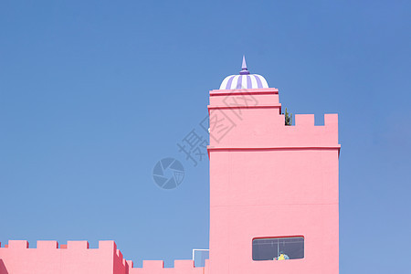 童话般的粉色建筑背景图片