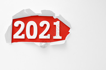 红色背景图2021年新年数字从纸上露出创意素材背景