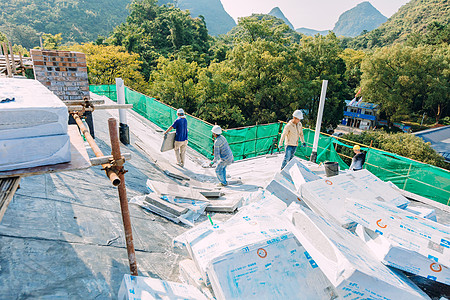 户外防水屋顶建筑工地户外正在施工的建筑工人背景