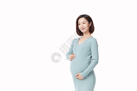 孕妇形象怀孕的人手摸肚子看前方背景图片