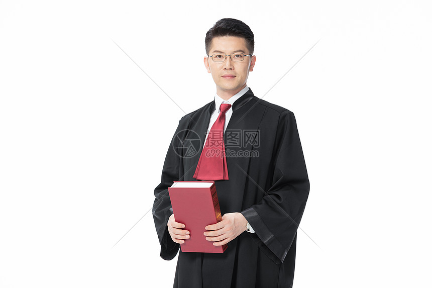 男性律师拿着法律法典图片