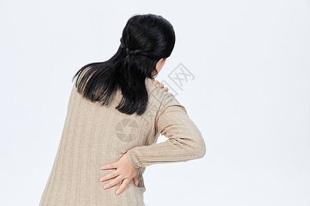 女性腰疼腰肌劳损的中年女性背景