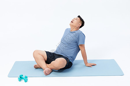 肥胖中年男性运动休息图片