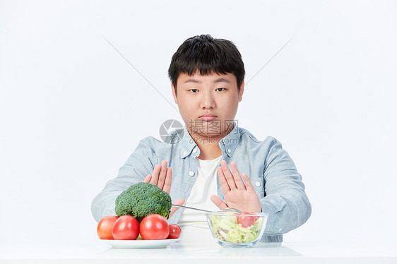 拒绝吃蔬菜水果的小胖墩图片