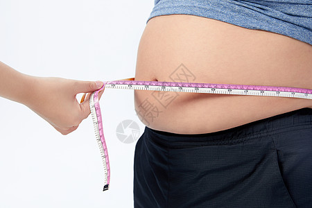 上门量尺中年肥胖男子测量腰围背景
