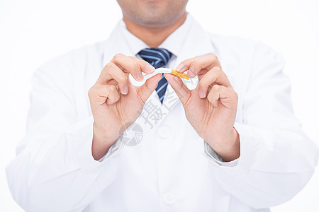 医生折弯一根香烟禁烟戒烟提示背景图片
