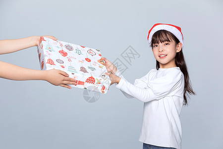 小女孩收到圣诞礼物高清图片
