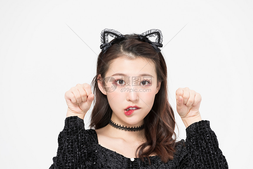 女孩cos猫耳朵写真性感咬嘴唇图片