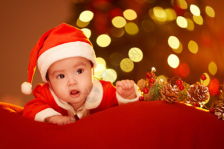 穿恐龙服的儿童圣诞节穿圣诞服的可爱婴儿背景