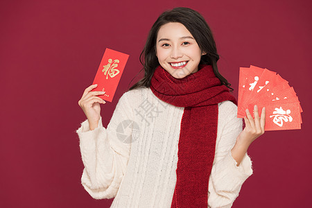 幸福快乐冬季新年美女送红包背景
