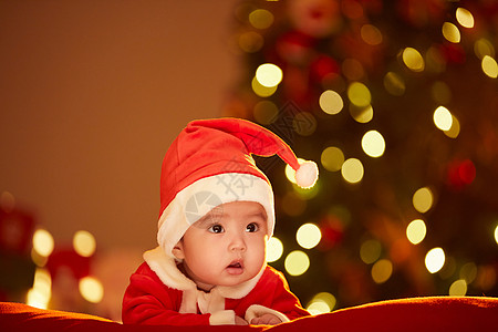 穿博士服的儿童圣诞节穿圣诞服的可爱婴儿背景