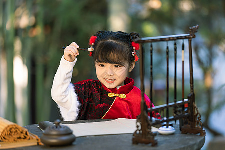 公园美宅毛笔字中国风小女孩公园里写书法毛笔字背景