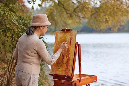 公园油画秋季老人公园里绘画油画背景