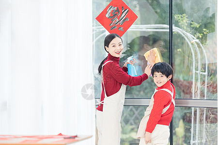 世界清洁日春节母子家庭大扫除背景