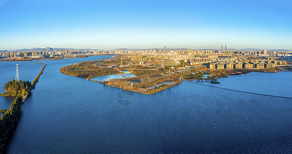 全景航拍昆明草海隧道口滇池城市风光图片