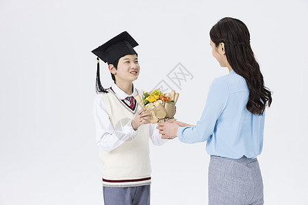 男孩送花给女孩老师为毕业的学生送花背景