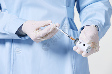 小型针管注射器护士打疫苗准备特写背景