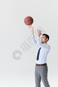 职场男性打篮球背景图片