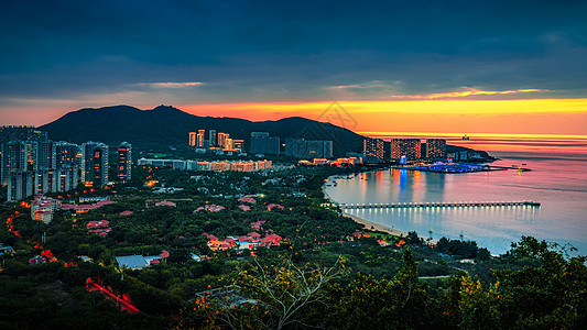 海南三亚鹿回头景区夕阳落日图片