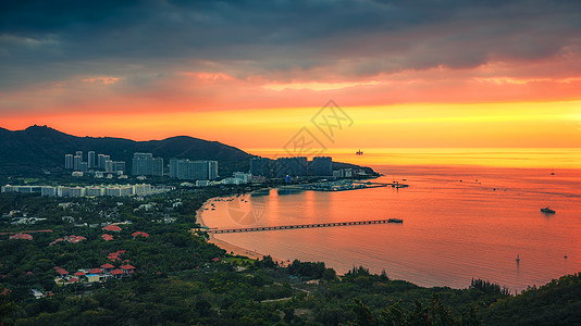 海南日落海南三亚鹿回头景区夕阳落日背景