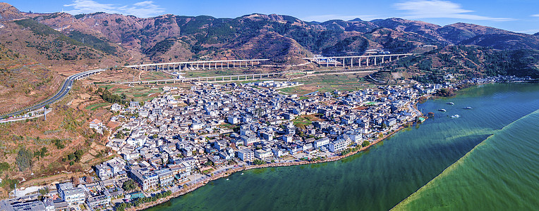 云南大理洱源村全景航拍大理康廊村民宿建筑高原交通背景