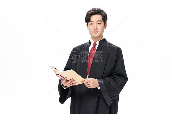 男性律师拿着法律法典图片