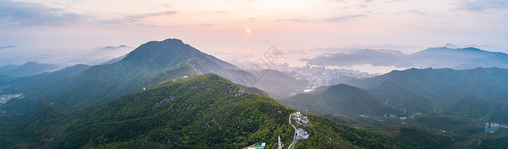 广东美术馆深圳梧桐山日出背景