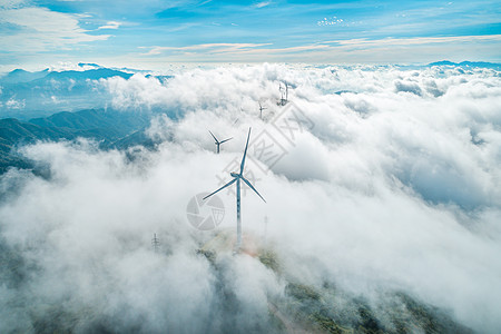 云海中的风力发电机高清图片