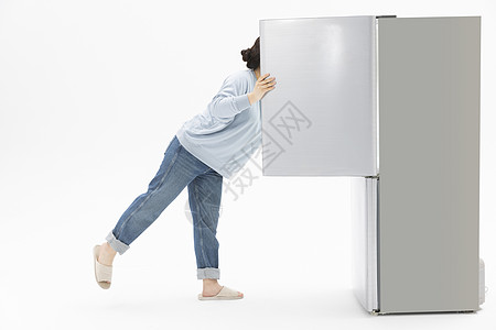头钻进冰箱的肥胖女性背景图片