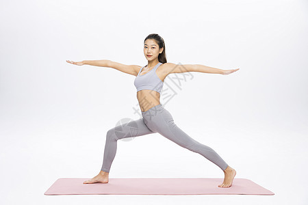 健身女性做瑜伽背景图片
